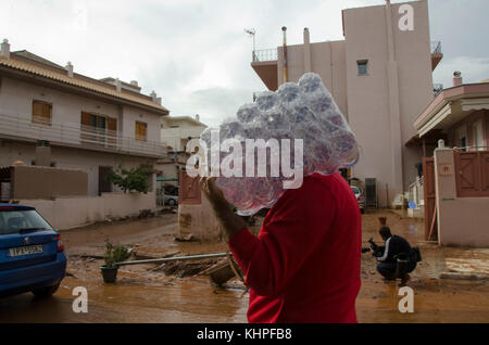 Mandra, Greece. 18th Nov, 2017. A flash flood in near the city of Mandra resulted in 17 confirmed deaths and many more injured. The floods came after a slow moving storm brought torrential rain overnight, 14 to 15 November. Roads, homes and businesses have been damaged. Credit: George Panagakis/Pacific Press/Alamy Live News Stock Photo