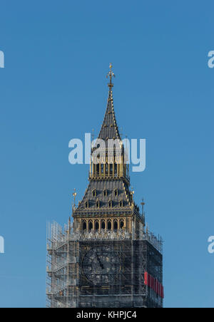 LONDON, UK - October 17th, 2017: close up of Scaffolding around the Elizabeth Tower, more commonly known as Big Ben, during the extensive restoration and repairs of the Houses of Parliament. Stock Photo