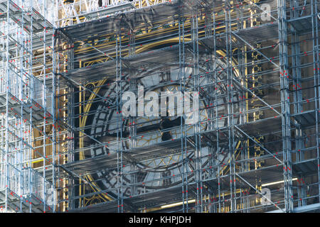 LONDON, UK - October 17th, 2017: close up of Scaffolding around the Elizabeth Tower, more commonly known as Big Ben, during the extensive restoration and repairs of the Houses of Parliament. Stock Photo