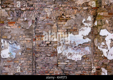 Old brick wall of an abandoned building Stock Photo