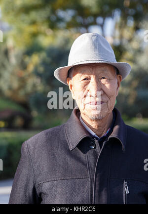 Zhangye,China - October 20,2017: Man dances traditional music in a public park on October 20, China. Stock Photo