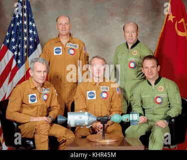 The Apollo-Soyuz crew, from left: American astronauts 'Deke' Slayton, Tom Stafford, Vance Brand, Russian cosmonauts Aleksey Leonov, Valeriy Kubasov pose for a group photo at the Johnson Space Center in Houston, Texas. The mission is to demonstrate that two different spacecraft can dock in space.  (photo by NASA via Planetpix) (photo by NASA via Planetpix) Stock Photo