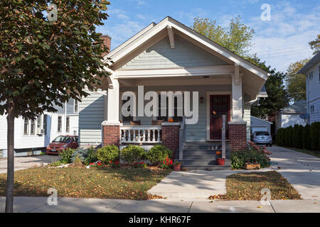 An abandoned, foreclosed house in Milwaukee, Wisconsin has been transformed into a home. Stock Photo