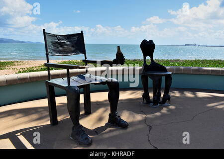 Male and Female chairs at the Strand in Townsville, Queensland, Australia. Stock Photo