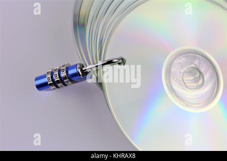 An concept Image of a cd and a lock - data security Stock Photo