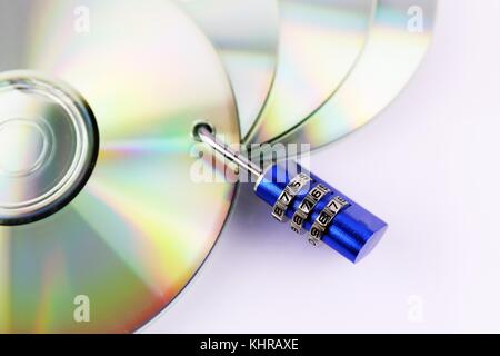 An concept Image of a cd and a lock - data security Stock Photo