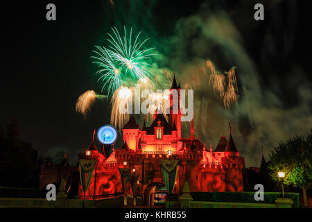 Anaheim: Night view with fireworks of the famous Cinderella castle of Disneyland on OCT 1, 2014 at Anaheim, Orange County, California, United States Stock Photo