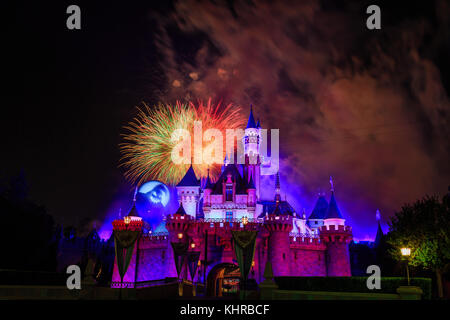 Anaheim: Night view with fireworks of the famous Cinderella castle of Disneyland on OCT 1, 2014 at Anaheim, Orange County, California, United States Stock Photo