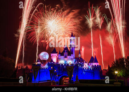 Anaheim: Night view with fireworks of the famous Cinderella castle of Disneyland on OCT 1, 2014 at Anaheim, Orange County, California, United States Stock Photo