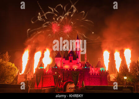 Anaheim: Night view with fireworks of the famous Cinderella castle of Disneyland on OCT 1, 2014 at Anaheim, Orange County, California, United States Stock Photo