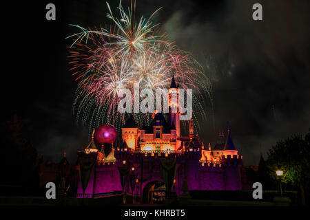 Anaheim: Night view with fireworks of the famous Cinderella castle of Disneyland on OCT 1, 2014 at Anaheim, Orange County, California, United States Stock Photo