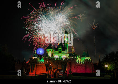 Anaheim: Night view with fireworks of the famous Cinderella castle of Disneyland on OCT 1, 2014 at Anaheim, Orange County, California, United States Stock Photo