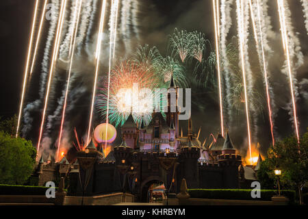 Anaheim: Night view with fireworks of the famous Cinderella castle of Disneyland on OCT 1, 2014 at Anaheim, Orange County, California, United States Stock Photo