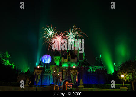 Anaheim: Night view with fireworks of the famous Cinderella castle of Disneyland on OCT 1, 2014 at Anaheim, Orange County, California, United States Stock Photo