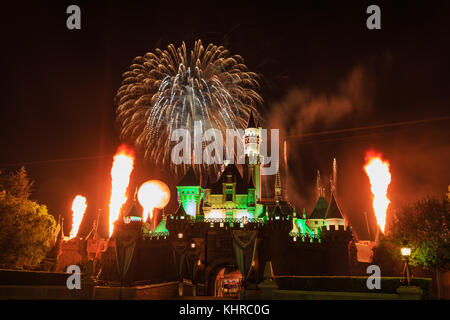 Anaheim: Night view with fireworks of the famous Cinderella castle of Disneyland on OCT 1, 2014 at Anaheim, Orange County, California, United States Stock Photo