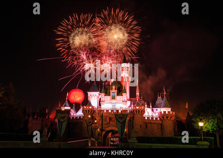 Anaheim: Night view with fireworks of the famous Cinderella castle of Disneyland on OCT 1, 2014 at Anaheim, Orange County, California, United States Stock Photo