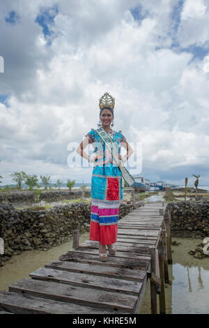 Michelle Victoria Alriani, 20, Miss Earth Indonesia 2017 pose for camera as a special guest during Wakatobi Wave Festival in Wanci, Wangi-Wangi. Stock Photo