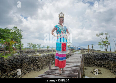 Michelle Victoria Alriani, 20, Miss Earth Indonesia 2017 pose for camera as a special guest during Wakatobi Wave Festival in Wanci, Wangi-Wangi. Stock Photo