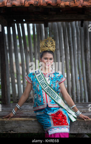 Michelle Victoria Alriani, 20, Miss Earth Indonesia 2017 pose for camera as a special guest during Wakatobi Wave Festival in Wanci, Wangi-Wangi. Stock Photo