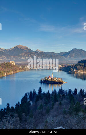 Elevated view of Lake Bled and the Church of Mary the Queen, located on a small island in the middle of the lake, Bled, Slovenia Stock Photo