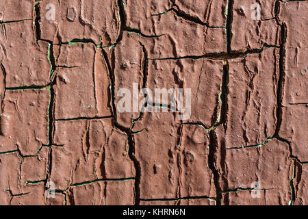 Texture Of Cracked Brown Paint On Wooden Wall Stock Photo