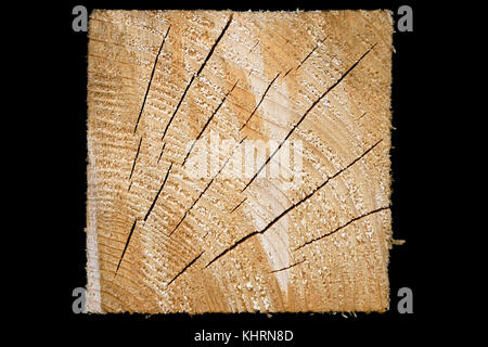 Square Block Of Pine Wood With Rings And Splits Isolated On Black Background Stock Photo