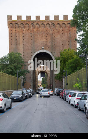 Gothic Porta Romana (Roman Gate) in city walls of Historic Centre of Siena listed World Heritage by UNESCO in Siena, Tuscany, Italy. 28 August 2017 ©  Stock Photo