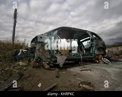 Car. Environmental damage and vandalism. Europe. Stock Photo