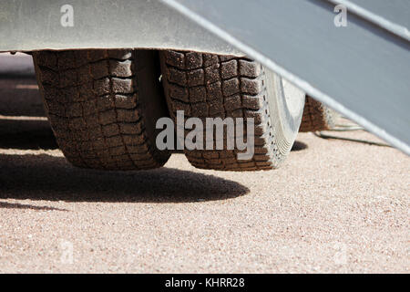 Truck strong outrigger stabilizing legs extended. Stock Photo