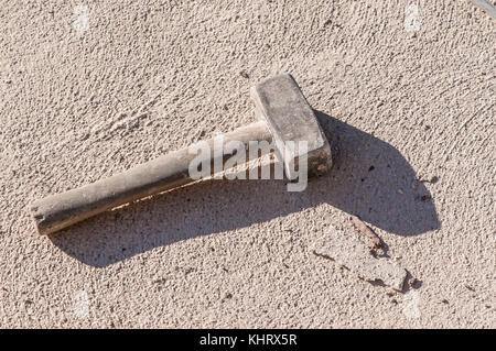 used hammer on the floor Stock Photo