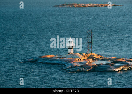 Helsinki, Finland. Lighthouse On Stone Island In Archipelago Near Helsinki. Stock Photo