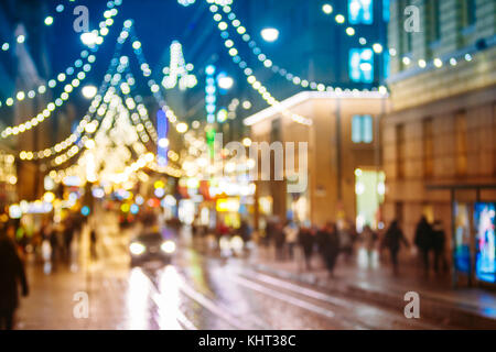 New Year Boke Lights Xmas Christmas Tree Decoration And Festive Illumination In . Natural Defocused Blue Bokeh Background Effect. Design Backdrop. Stock Photo