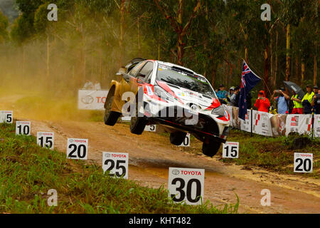 Esapekka Lappi (FIN) and co-driver Janne Ferm (FIN) of Toyota Gazoo Racing get some air on a jump during during the Wedding Wells Power Stage on the final day of the Rally Australia round of the 2017 FIA World Rally Championship in Australia. Stock Photo