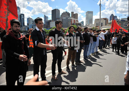 Melbourne, Australia. 19th Nov, 2017. Shiite Muslims mourners are participating in march during a religious procession in Melbourne on Sunday, November 19, 2017 Chehlum (40th day) Of Martyrdom Imam Hussain (A.S) the grandson of the prophet Mohammad In Melbourne. Credit: Mirza .M. Hassan/Pacific Press/Alamy Live News