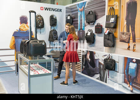 KIEV, UKRAINE - OCTOBER 07, 2017: Unrecognized presenters work on Wenger, a Swiss company booth during CEE 2017, the largest electronics trade show of Stock Photo
