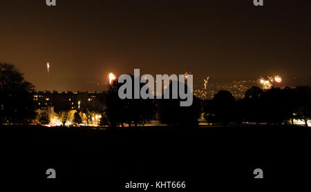 Firework displays around Bath, Somerset, UK. Composite of several bonfire night displays seen from Bath Appoach Golf Course Stock Photo