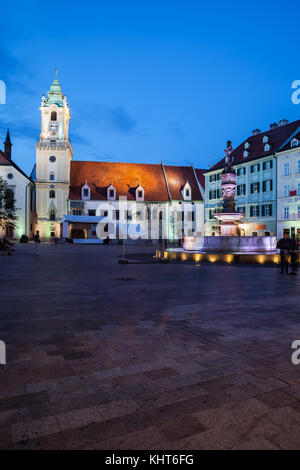 Bratislava Old Town Main Square at night in Slovakia with Roland Fountain and Old Town Hall building. Stock Photo