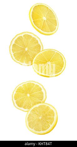 Isolated falling lemon pieces. Slices of lemon in the air isolated on white background with clipping path Stock Photo