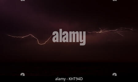 Lightning on the sky over the ocean Stock Photo