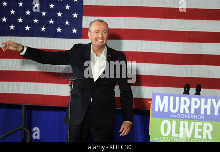 NEWARK,  NJ - OCTOBER 19: Former U.S. President Barack Obama walks on stage in support of Democratic candidate Phil Murphy, who is running against Republican Lt. Gov. Kim Guadagno for the governor of New Jersey on September 19, 2017 in Newark, New Jersey.   People:  Phil Murphy Stock Photo