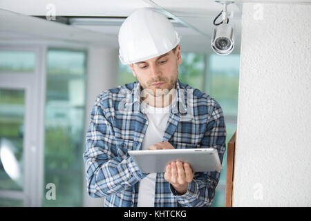 professional cctv technician working Stock Photo