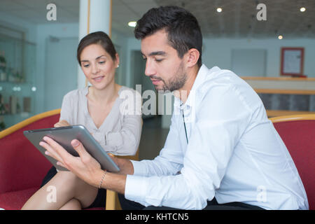 business people using electronic tab Stock Photo