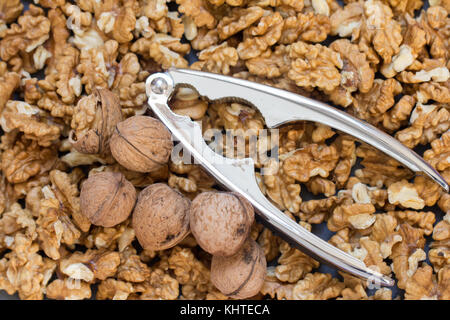 peeled wallnuts with cracker Stock Photo