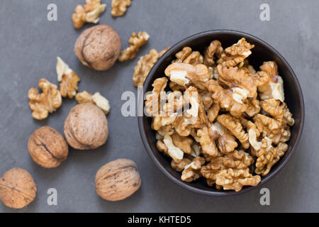 wallnuts composition on black slate background Stock Photo
