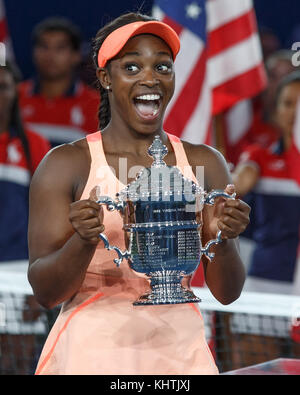 American tennis player SLOANE STEPHENS poses with the championship trophy during the trophy ceremony after the Women's Singles finals match at the US  Stock Photo