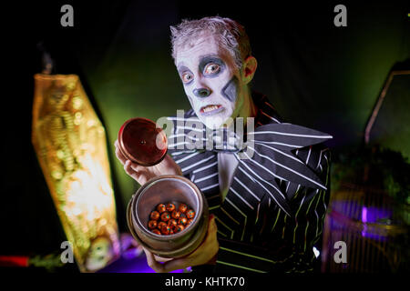 Lowry Outlet Mall at MedicityUK, Salford Quays, Greater Manchester, hold a Spooktacular event inside the mall. Pictured a man dressed as a skeleton ho Stock Photo