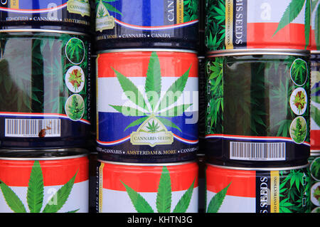 Tins of cannabis seeds for sale at the world famous floating flower market on the Singel canal, in Amsterdam in the Netherlands Stock Photo