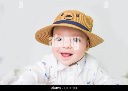 baby boy with straw hat Stock Photo