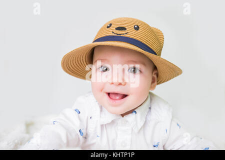 baby boy with straw hat Stock Photo