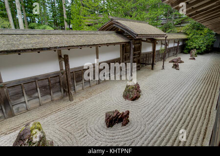 Koya San Wakayama Osaka - October 2017 - Traditional Japanese House Building Temple with Stone Garden. Banryutei Rock Garden sky and Clouds Stock Photo